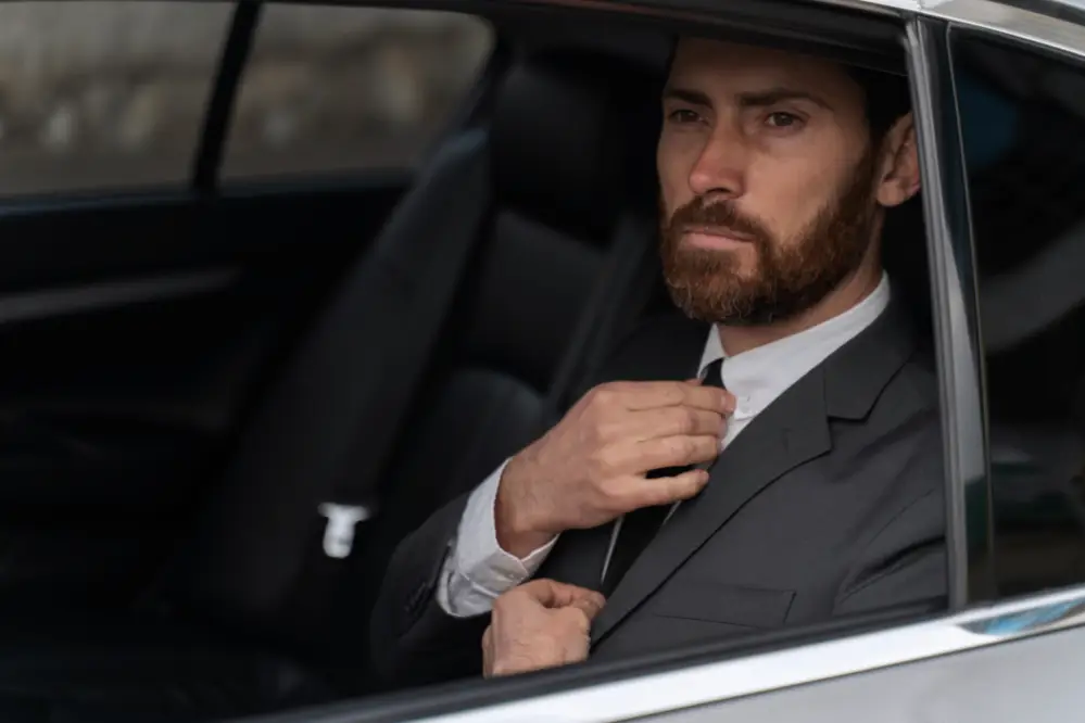 Luxury sedan with visible denver limo hourly rates tag for service transparency