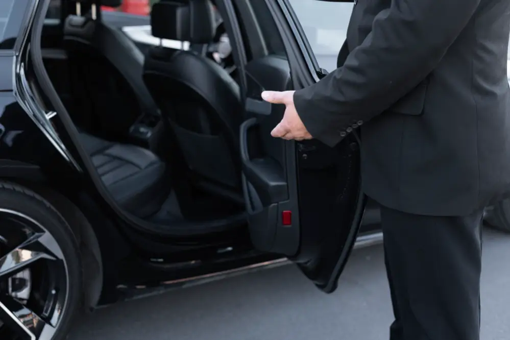 Chauffeur at Denver terminal offering hourly denver chauffeur service