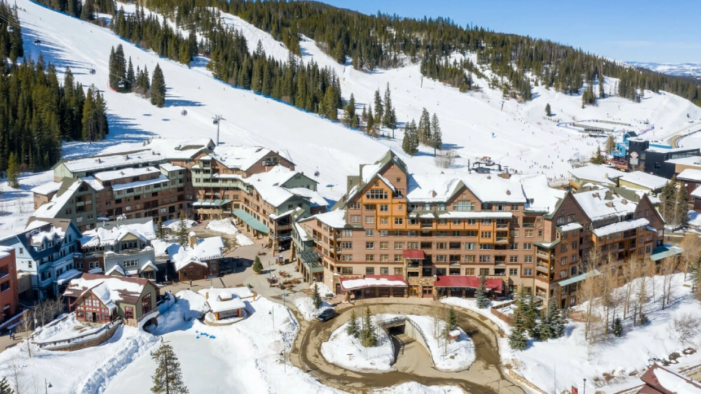 Luxury black vehicle traveling through Colorado toward Winter Park Ski Resort