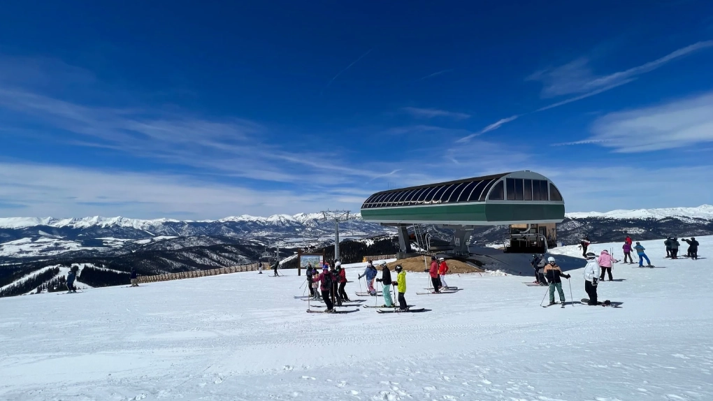 Luxury black vehicle traveling through Colorado toward Keystone Ski Resort
